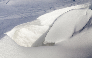 Image showing broken snow drift from