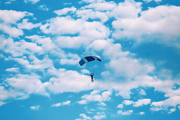 Image showing parachuting sport in sunset sky