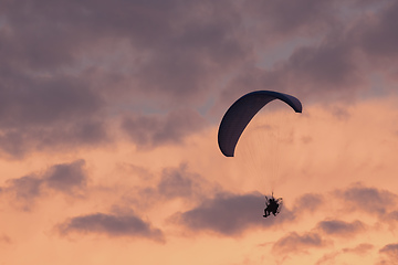 Image showing parachuting sport in sunset sky