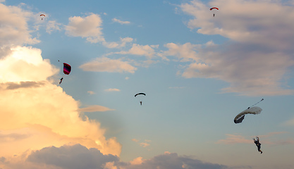 Image showing parachuting sport in sunset sky