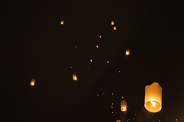 Image showing Sky lanterns glowing in night