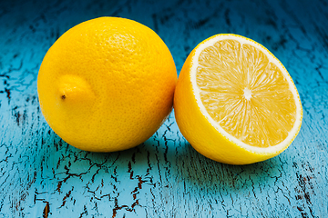 Image showing Lemon and cut half slice