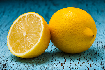 Image showing Lemon and cut half slice