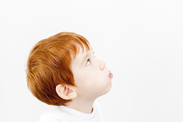 Image showing A boy in a white T-shirt