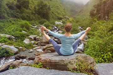 Image showing Woman doing yoga outdoors