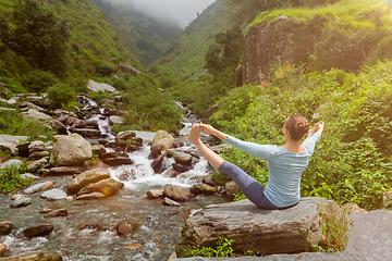 Image showing Woman doing Ashtanga Vinyasa Yoga asana outdoors