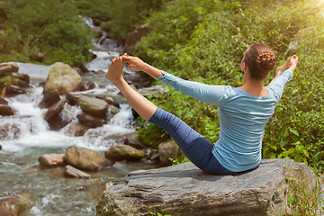 Image showing Woman doing yoga outdoors