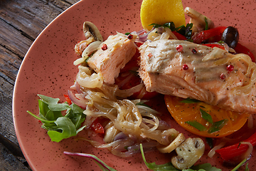 Image showing Steamed salmon with vegetables on a plate.