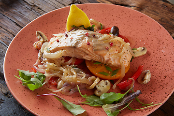 Image showing Steamed salmon with vegetables on a plate.