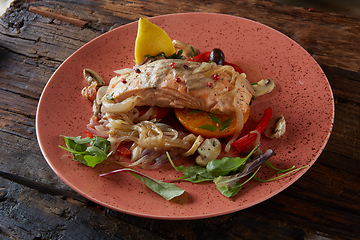 Image showing Steamed salmon with vegetables on a plate.