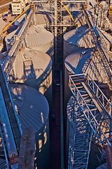 Image showing Modern silos for storing grain harvest. Agriculture. Background.