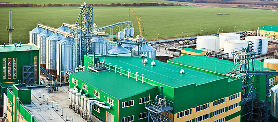 Image showing Modern silos for storing grain harvest. Agriculture. Background.