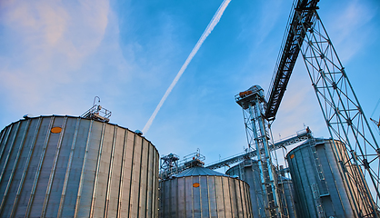 Image showing Modern silos for storing grain harvest. Agriculture. Background.