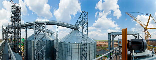 Image showing Modern silos for storing grain harvest. Agriculture. Background.