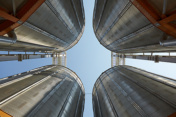 Image showing Modern silos for storing grain harvest. Agriculture. Background.