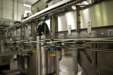 Image showing Production of the bottles plastic The Technological line on production of the plastic bottles.