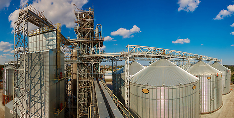 Image showing Modern silos for storing grain harvest. Agriculture. Background.