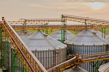 Image showing Modern silos for storing grain harvest. Agriculture. Background.