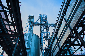 Image showing Modern silos for storing grain harvest. Agriculture. Background.