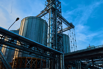 Image showing Modern silos for storing grain harvest. Agriculture. Background.