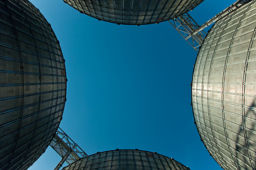 Image showing Modern silos for storing grain harvest. Agriculture. Background.