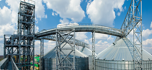 Image showing Modern silos for storing grain harvest. Agriculture. Background.