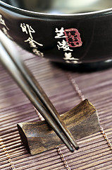 Image showing Rice bowl and chopsticks