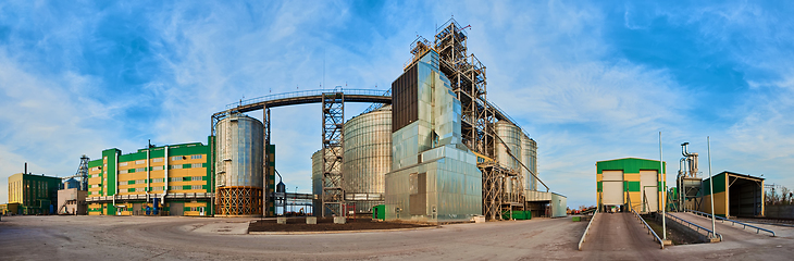 Image showing Modern silos for storing grain harvest. Agriculture. Background.