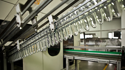 Image showing Production of the bottles plastic The Technological line on production of the plastic bottles.