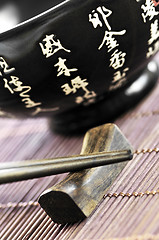 Image showing Rice bowl and chopsticks