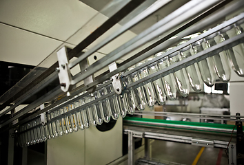 Image showing Production of the bottles plastic The Technological line on production of the plastic bottles.