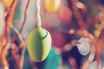 Image showing Easter eggs on tree with bokeh