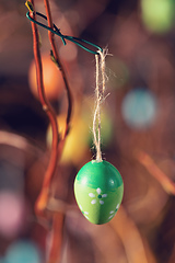 Image showing Easter eggs on tree with bokeh