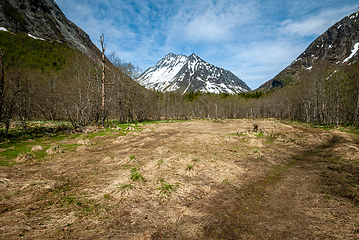 Image showing snowy mountain peak with foreground just clear of snow