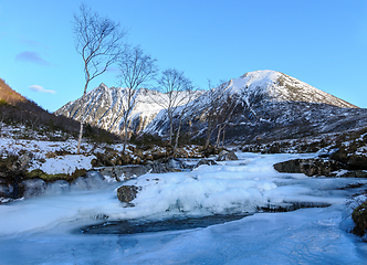 Image showing frozen river in front of mountain peak