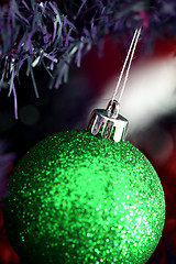 Image showing Christmas ornaments on tree.