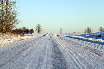 Image showing Track on a snow-covered road