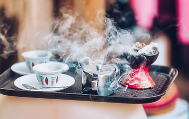 Image showing cup of Ethopian coffee with aromatic frankincense