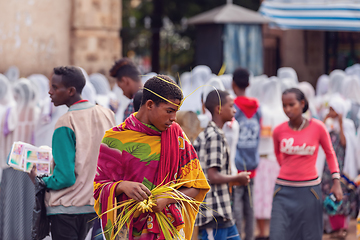 Image showing Orthodox Christian pilgrim at worship on the street during easter