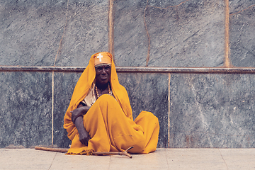 Image showing Monk rest in shadow of Church of Our Lady of Zion in Axum