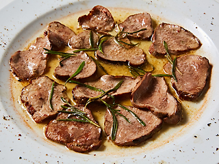 Image showing Fried beef tongue with coarse salt. Grilled beef tongue.