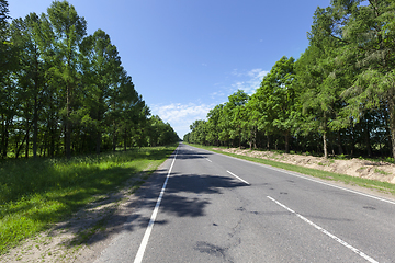 Image showing Road along the forest journey Europe