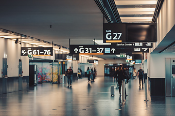 Image showing Peoples walking in Vienna airport terminal