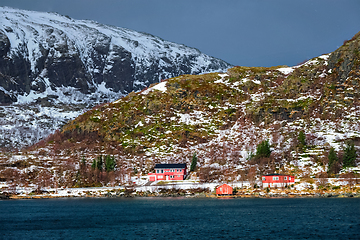 Image showing Red rorbu houses in Norway in winter