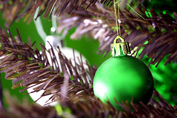 Image showing Christmas ornaments on tree.