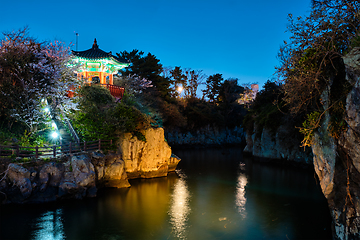 Image showing Yongyeon Pond with Yongyeon Pavilion illuminated at night, Jeju islands, South Korea