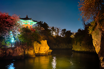 Image showing Yongyeon Pond with Yongyeon Pavilion illuminated at night, Jeju islands, South Korea