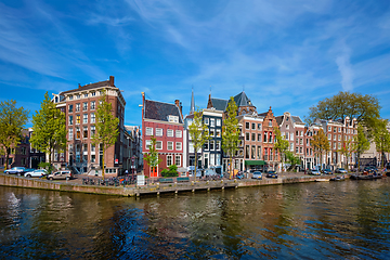 Image showing Amterdam canal, bridge and medieval houses