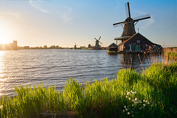 Image showing Windmills at Zaanse Schans in Holland on sunset. Zaandam, Nether