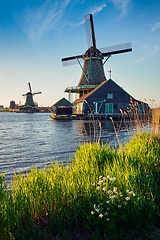 Image showing Windmills at Zaanse Schans in Holland on sunset. Zaandam, Nether